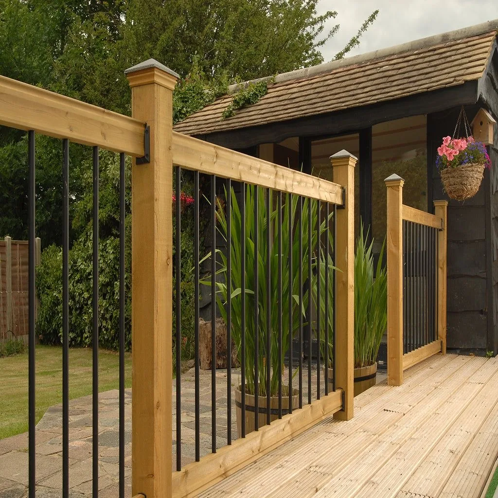 Wood post railing with black metal balusters