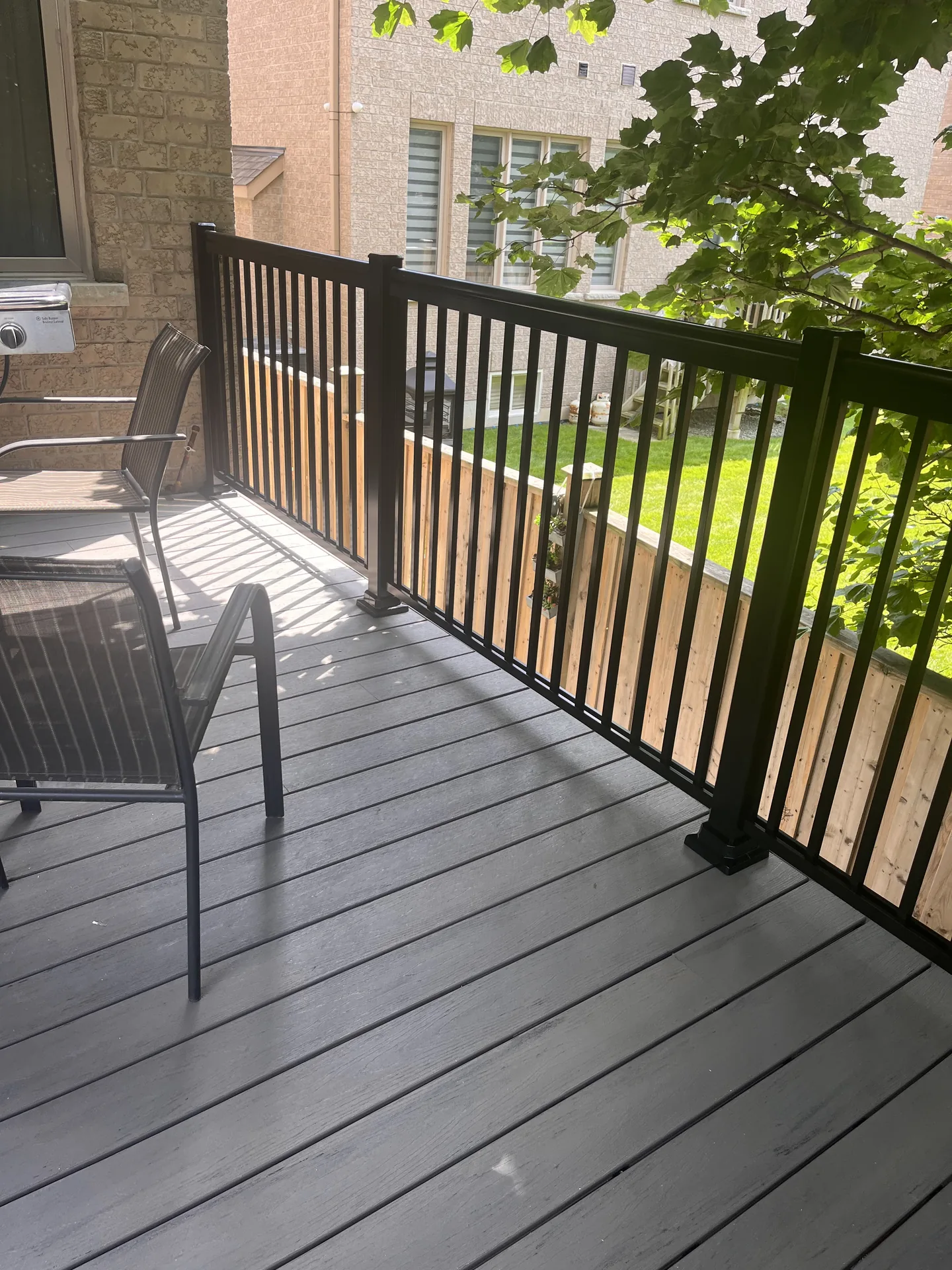 Grey deck boards with black exterior railing