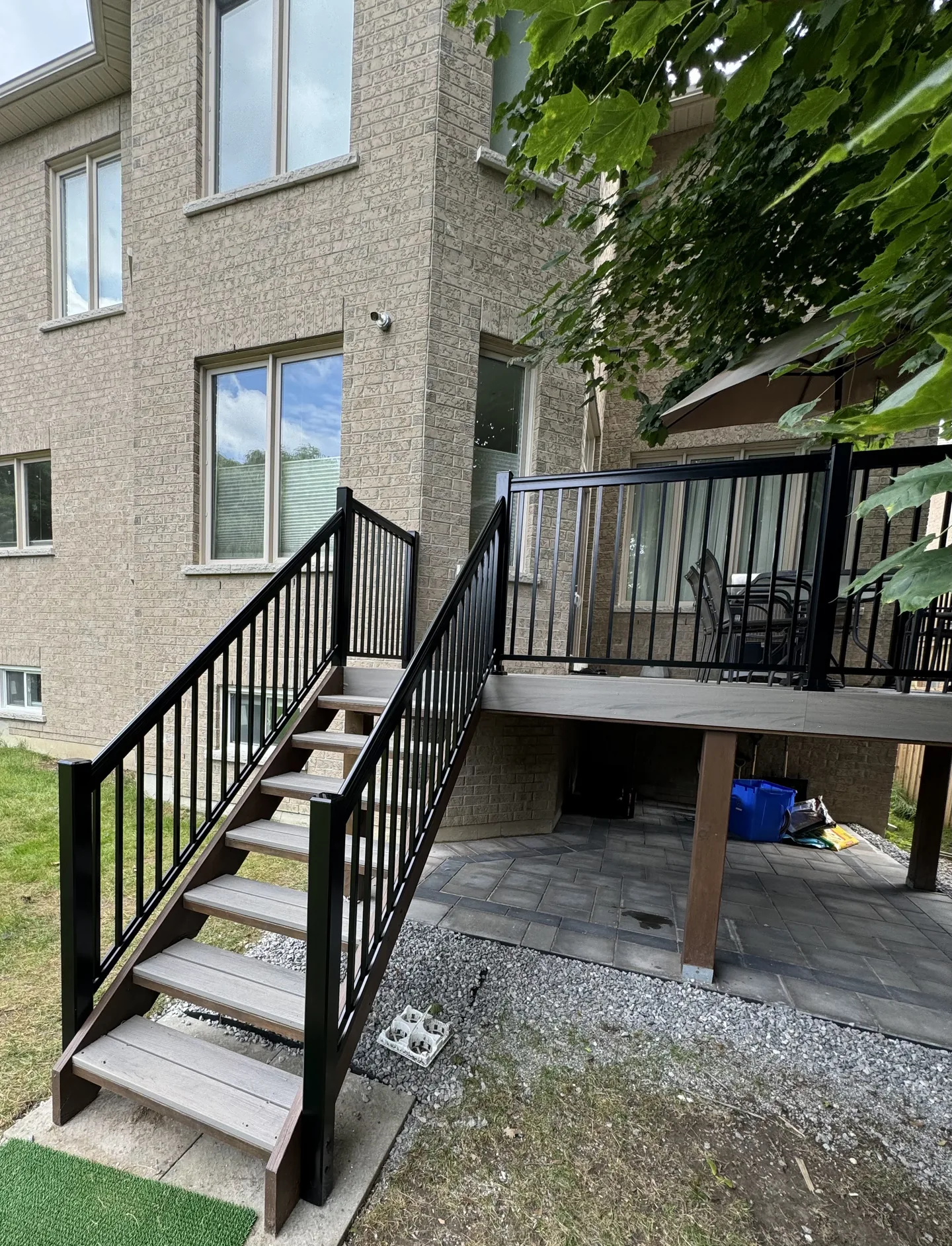 Raised deck and stairway with black exterior railings